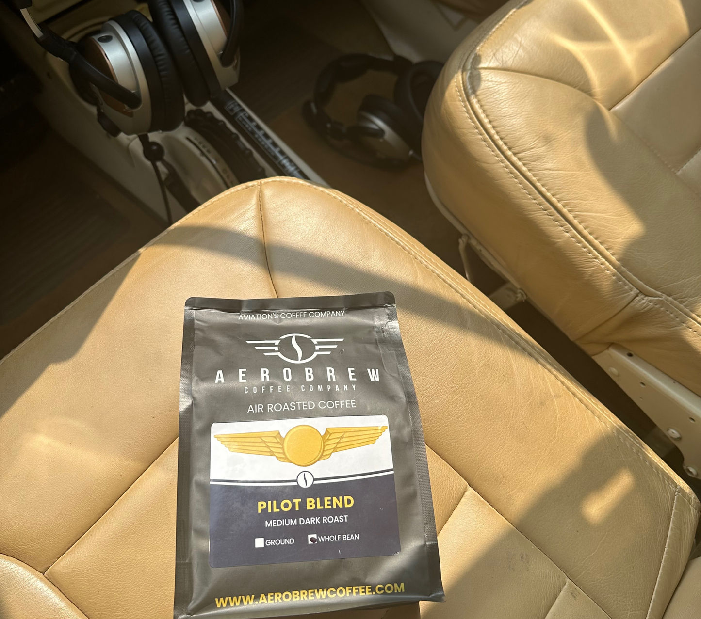 Aerobrew coffee package on a airplane seat