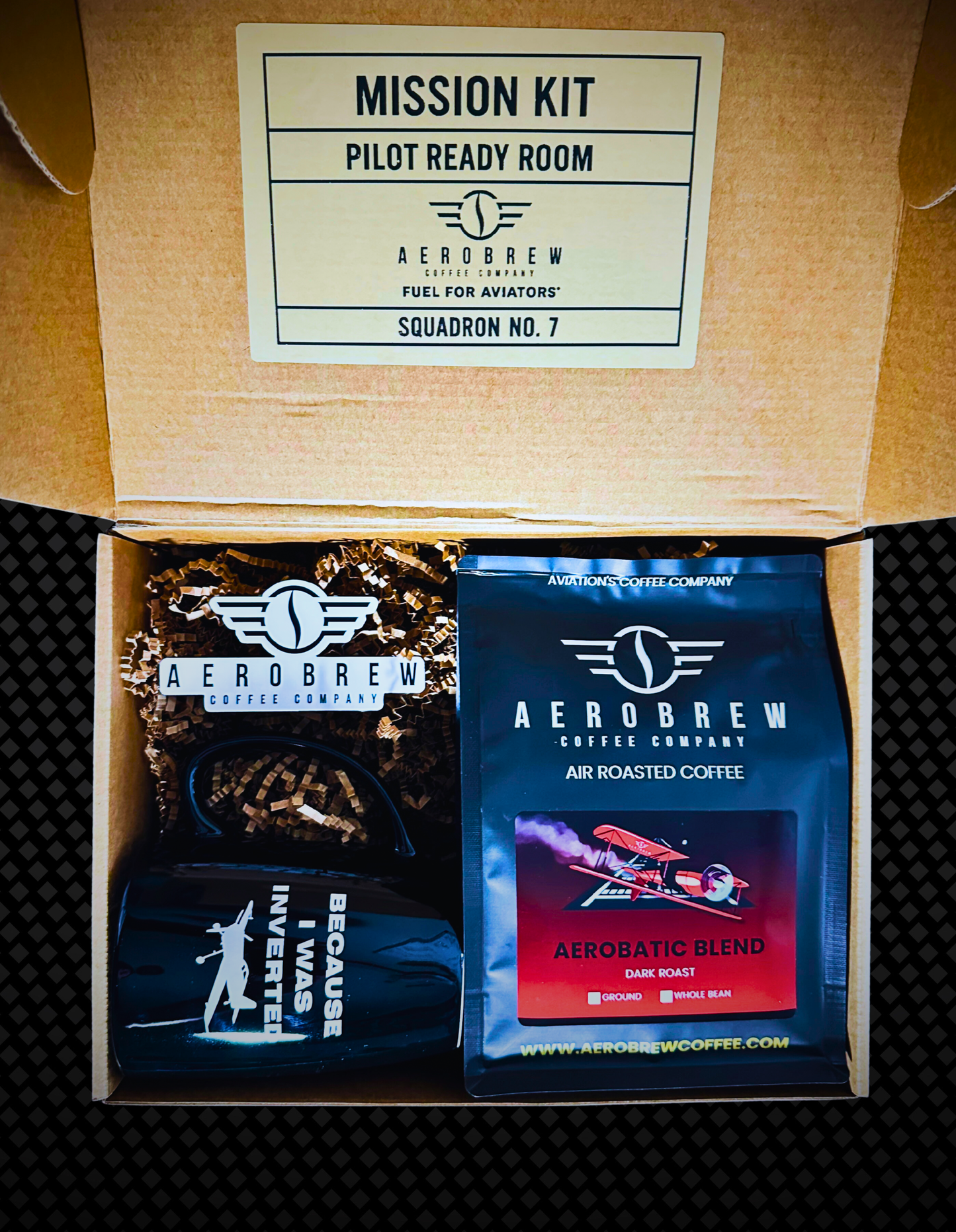 Aerobrew coffee company mission kit with coffee packages and branded items.
