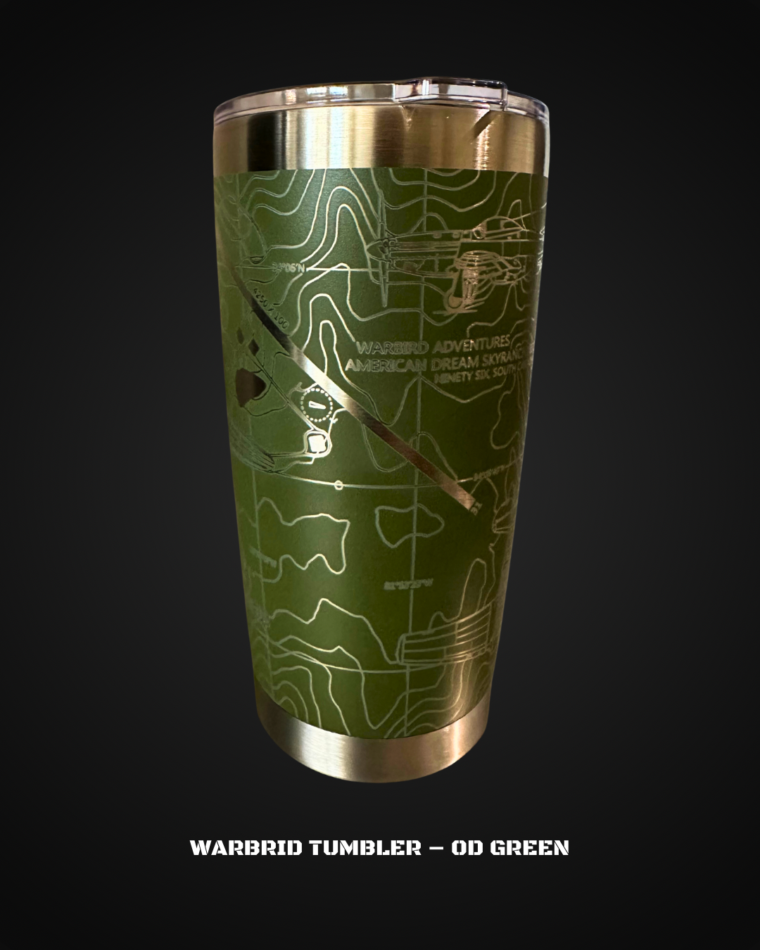 Green tumbler with engraved design on a black background