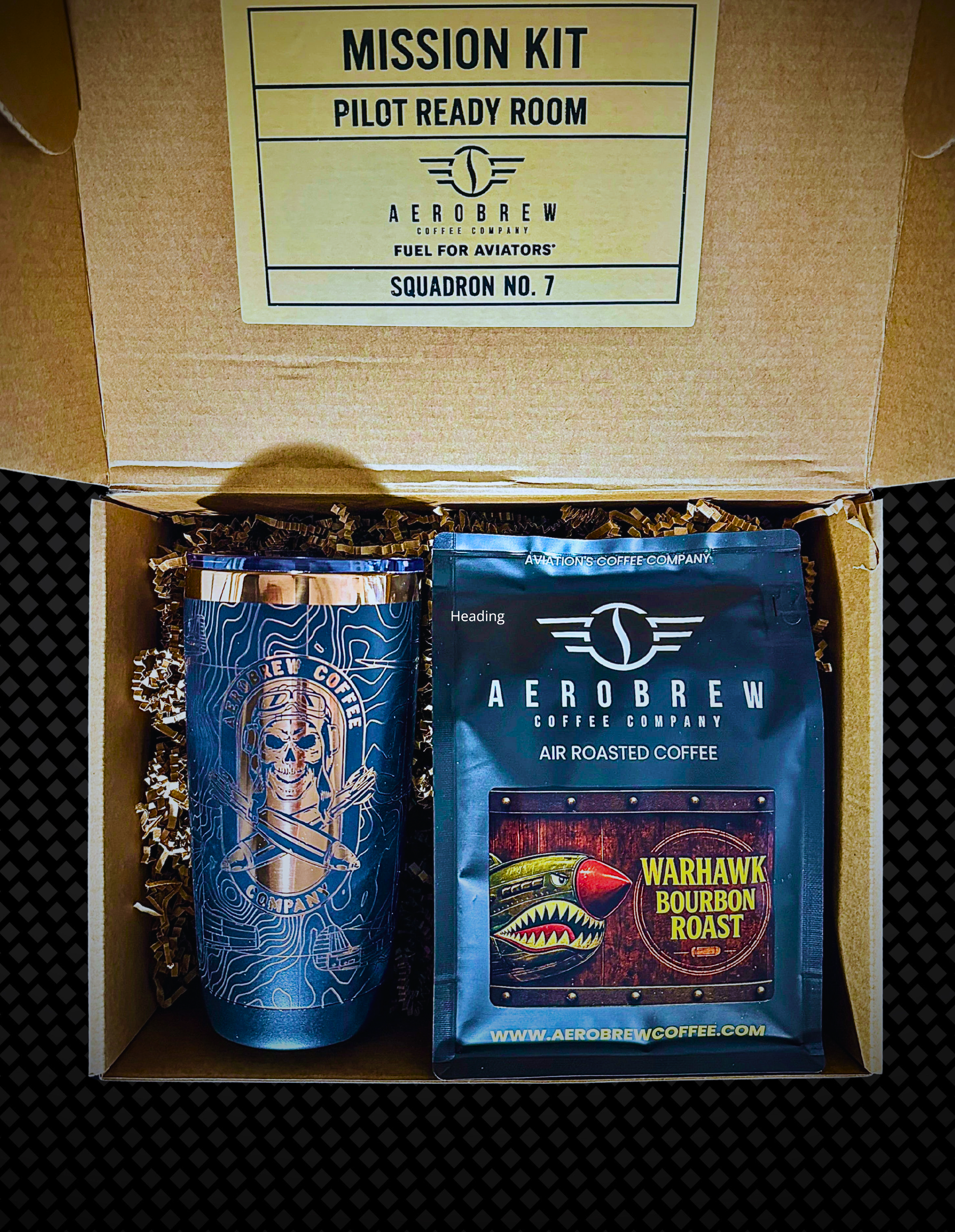 AeroBrew coffee package with a tumbler and coffee bag in a cardboard box labeled 'Mission Kit'.