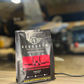 Aerobrew coffee package on a table with a blurred background