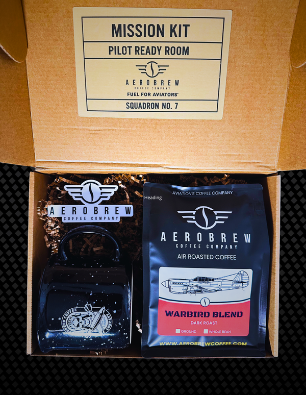 AeroBrew coffee kit with coffee bag and carafe in a cardboard box.